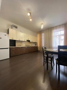 Kuchyň nebo kuchyňský kout v ubytování Afina Aparthotel