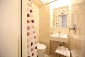 Koupelna v ubytování Hotel Touring