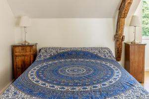 Postel nebo postele na pokoji v ubytování Chambre d'hôtes Kerdary
