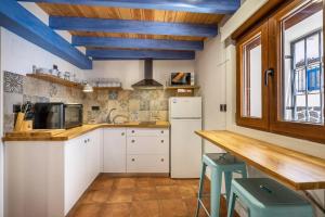 Kuchyň nebo kuchyňský kout v ubytování Ruralya Alojamientos Granada Higueras Home + 8 fotografií