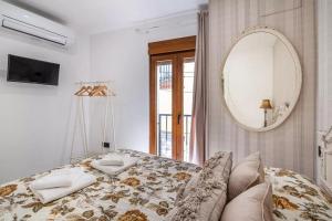 Postel nebo postele na pokoji v ubytování Ruralya Alojamientos Granada Higueras Home