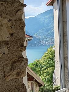 a view of a lake from a window at Casa Amelia in Nesso