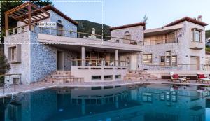 Piscina a Gardenia Junior Suite In Epidavros with Shared Pool o a prop