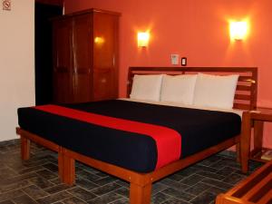 Postel nebo postele na pokoji v ubytování Hotel Soberanis