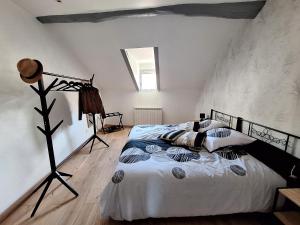 Rúm í herbergi á le Nolaytoît