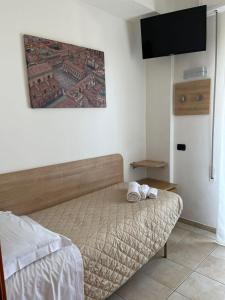 Postel nebo postele na pokoji v ubytování Hotel Costazzurra by Interlux