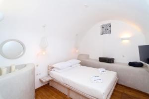 Postel nebo postele na pokoji v ubytování Cortile delle Stelle