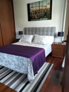 Łóżko lub łóżka w pokoju w obiekcie apartment garden