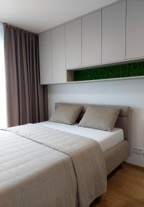 Postel nebo postele na pokoji v ubytování Apartman Zoku s private garage parking free