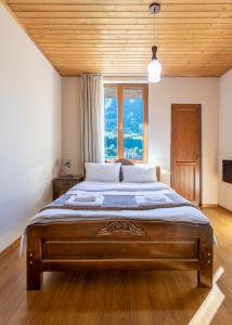 Letto o letti in una camera di Guest House Nikala