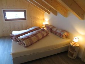 Postel nebo postele na pokoji v ubytování Apartments Resi