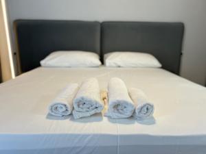 Postel nebo postele na pokoji v ubytování OLEA Family Apt Sea View