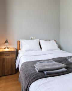 Letto o letti in una camera di Guest House Nikala