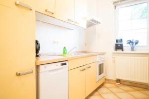 Η κουζίνα ή μικρή κουζίνα στο Windflüchter - Bucht +5 φωτογραφίες