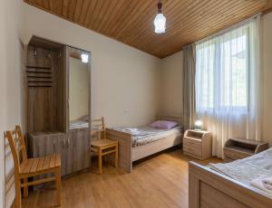 Letto o letti in una camera di Guest House Nikala