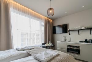 Ένα ή περισσότερα κρεβάτια σε δωμάτιο στο Frost Apartments by Heimaleiga