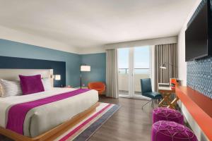 Ein Bett oder Betten in einem Zimmer der Unterkunft TRYP by Wyndham Isla Verde