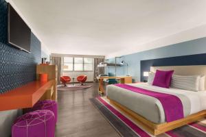 Ein Bett oder Betten in einem Zimmer der Unterkunft TRYP by Wyndham Isla Verde