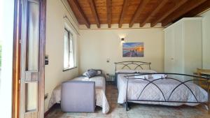 Postel nebo postele na pokoji v ubytování B&B Relax Rooms - Peschiera del Garda