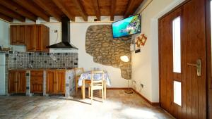 TV a/nebo společenská místnost v ubytování B&B Relax Rooms - Peschiera del Garda