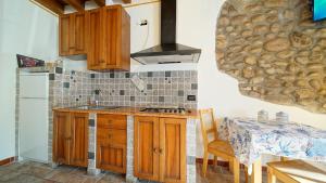 Kuchyň nebo kuchyňský kout v ubytování B&B Relax Rooms - Peschiera del Garda