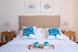 Postel nebo postele na pokoji v ubytování Ermes by PortofinoHomes