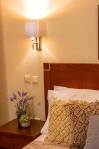 Ein Bett oder Betten in einem Zimmer der Unterkunft Hotel Marina