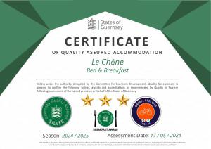 certificate of qualification for the certificate of quality assured accommodation le crime bed at Le Chene Hotel in St Peter Port