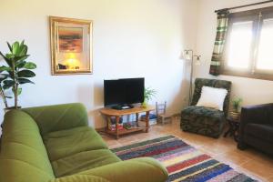 TV a/nebo společenská místnost v ubytování Apartamento en Bérchules