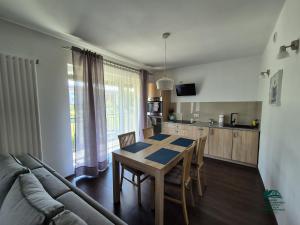 Kuchyňa alebo kuchynka v ubytovaní Apartamenty Maria