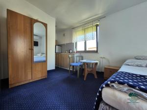 Posteľ alebo postele v izbe v ubytovaní Apartamenty Maria