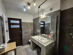 Kúpeľňa v ubytovaní Apartamenty Maria + 37 fotografií
