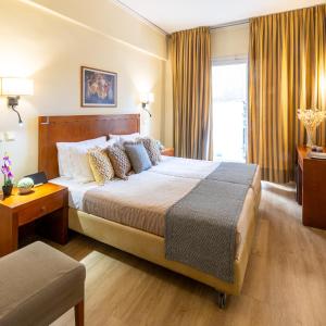 Postel nebo postele na pokoji v ubytování Hotel Marina