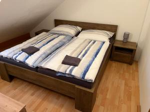 Postel nebo postele na pokoji v ubytování Apartman Na Bubnu