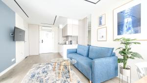 Posedenie v ubytovaní Prywatne Apartamenty Sun & Snow w Wave z basenem