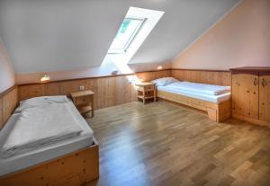 Rúm í herbergi á JUFA Hotel Gitschtal