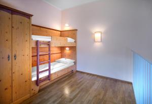 Rúm í herbergi á JUFA Hotel Gitschtal