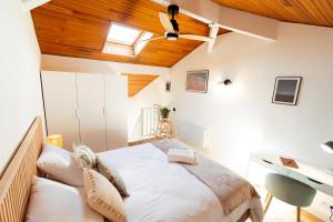 En eller flere senge i et værelse på Les Balcons du Golfe - Cozy & moderne Moliets Plage