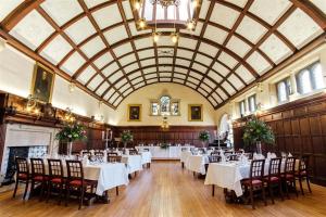 a large room with tables and chairs in it at Westminster College in Cambridge