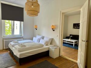 Postel nebo postele na pokoji v ubytování Grand Hostel Berlin Classic + 37 fotografií