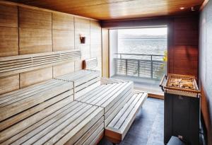 Postel nebo postele na pokoji v ubytování Seevital Hotel & SPA - Ihr 4 Sterne Superior Hideaway direkt am See