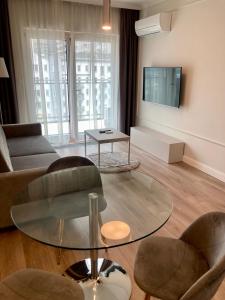 Et tv og/eller underholdning på Mennica Residence de luxe Waliców 11