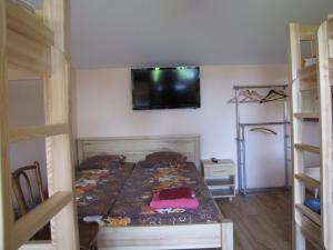 Postel nebo postele na pokoji v ubytování Smaidas apartamenti