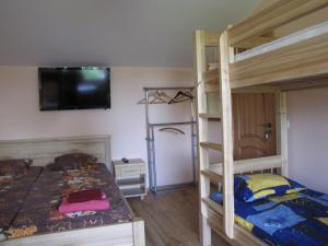 Postel nebo postele na pokoji v ubytování Smaidas apartamenti