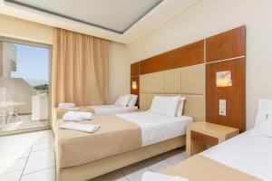 Voodi või voodid majutusasutuse Esperia Hotel toas