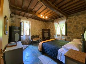 Postel nebo postele na pokoji v ubytování OASI LIGNANA Suite Apartments