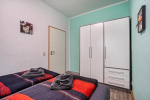 Postel nebo postele na pokoji v ubytování Ferienwohnung Classic