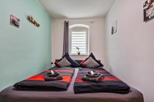 Postel nebo postele na pokoji v ubytování Ferienwohnung Classic