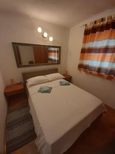 Postel nebo postele na pokoji v ubytování NIVES B. + 37 fotografií
