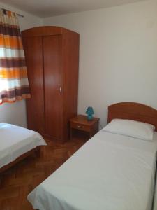 Postel nebo postele na pokoji v ubytování NIVES B.